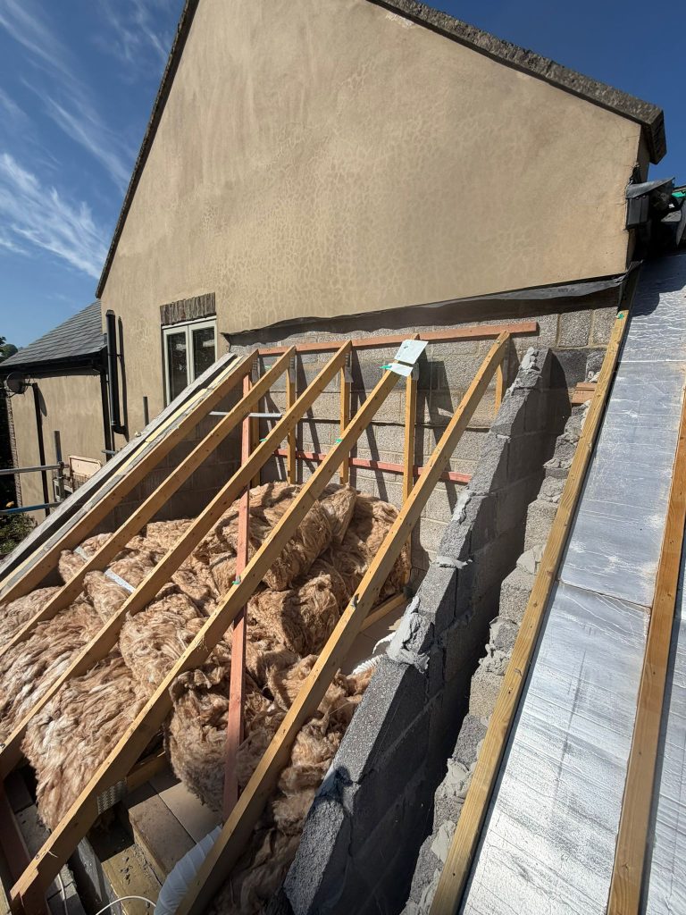 New slate roof under construction