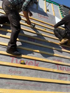 Installing gold treated battens on a roof near Shepton Mallet