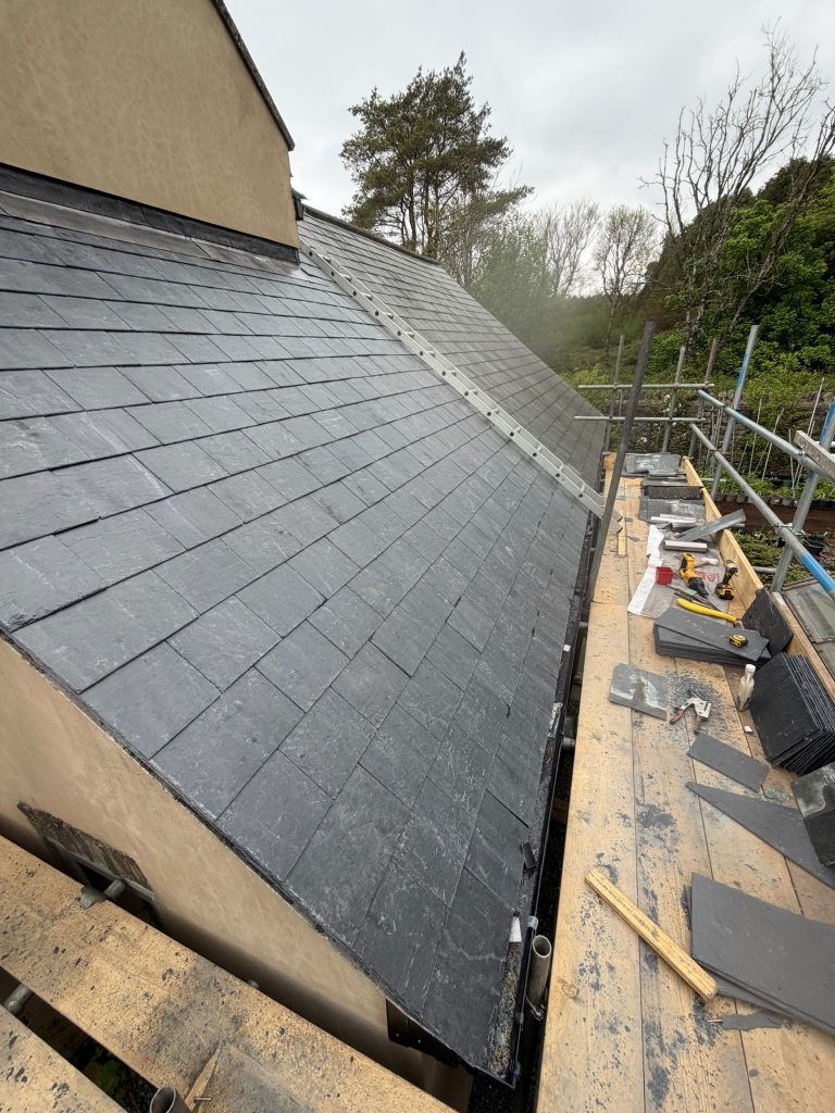A completed slate roof installation in Oakhill Somerset