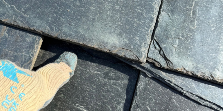 A damaged slate roof in Shepton Mallet