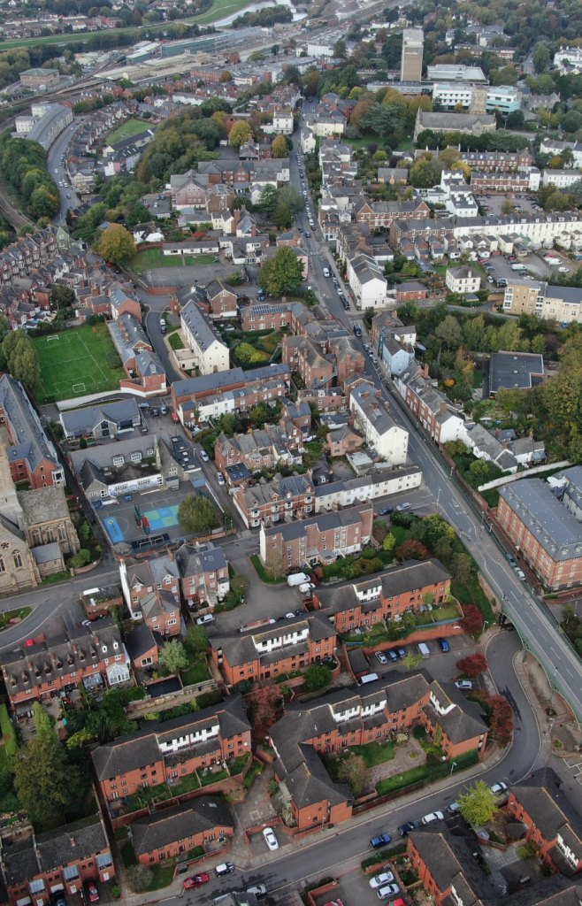 Aerial view of residential & commercial buildings in Exeter
