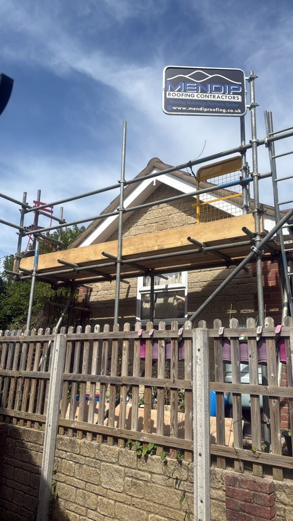 Scaffolding installed by Mendip Roofing Contractors on a house