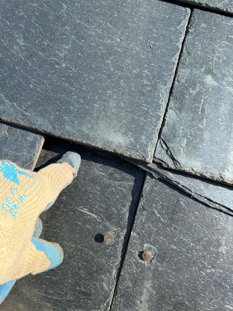 Pointing out issues with a slate roof