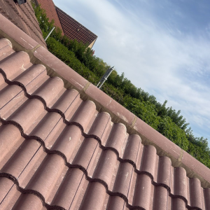 A house with newly installed roof tiles