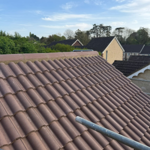 Newly installed roof tiles on a house in Somerset