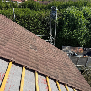 Roof tiles being installed on a house in Somerset by Mendip Roofing Contractors