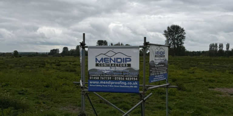 Landscape image of Mendip Roofing Contractors banners on Mear Road Glastonbury